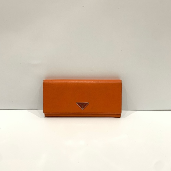 Prada Accessories - Prada Orange Leather Bifold Long Wallet  (Gently used, rubbing, marks)